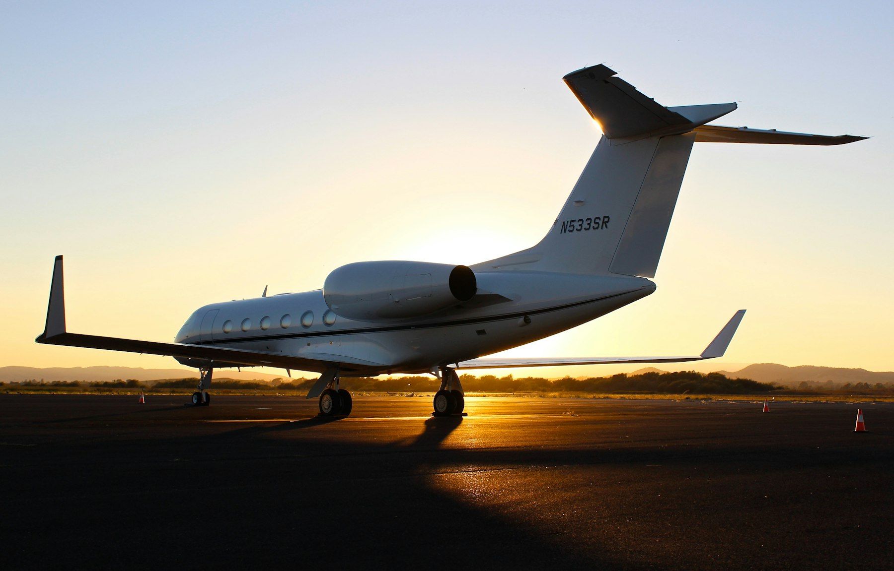 Business jet at sunset